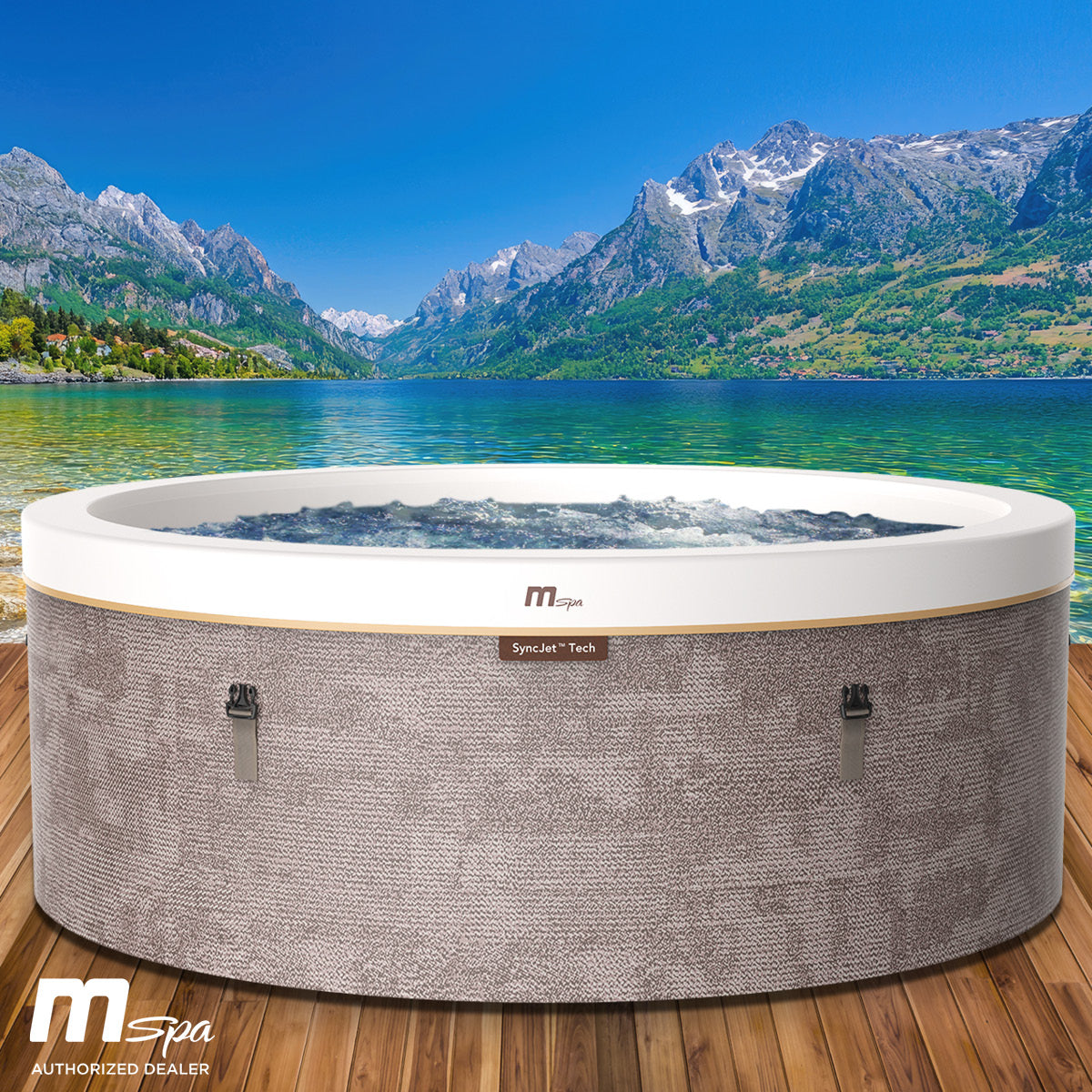 Runder grauer mSpa Cocoon Eco Whirlpool für 6 Personen mit weißer Oberkante vor Bergkulisse.