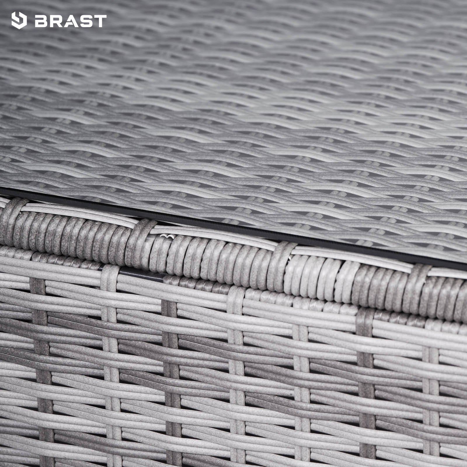 Grau geflochtenes Polyrattan als Detail eines Lounge Gartensmöbel Sets aus Rattan Lounge Loungemöbeln.