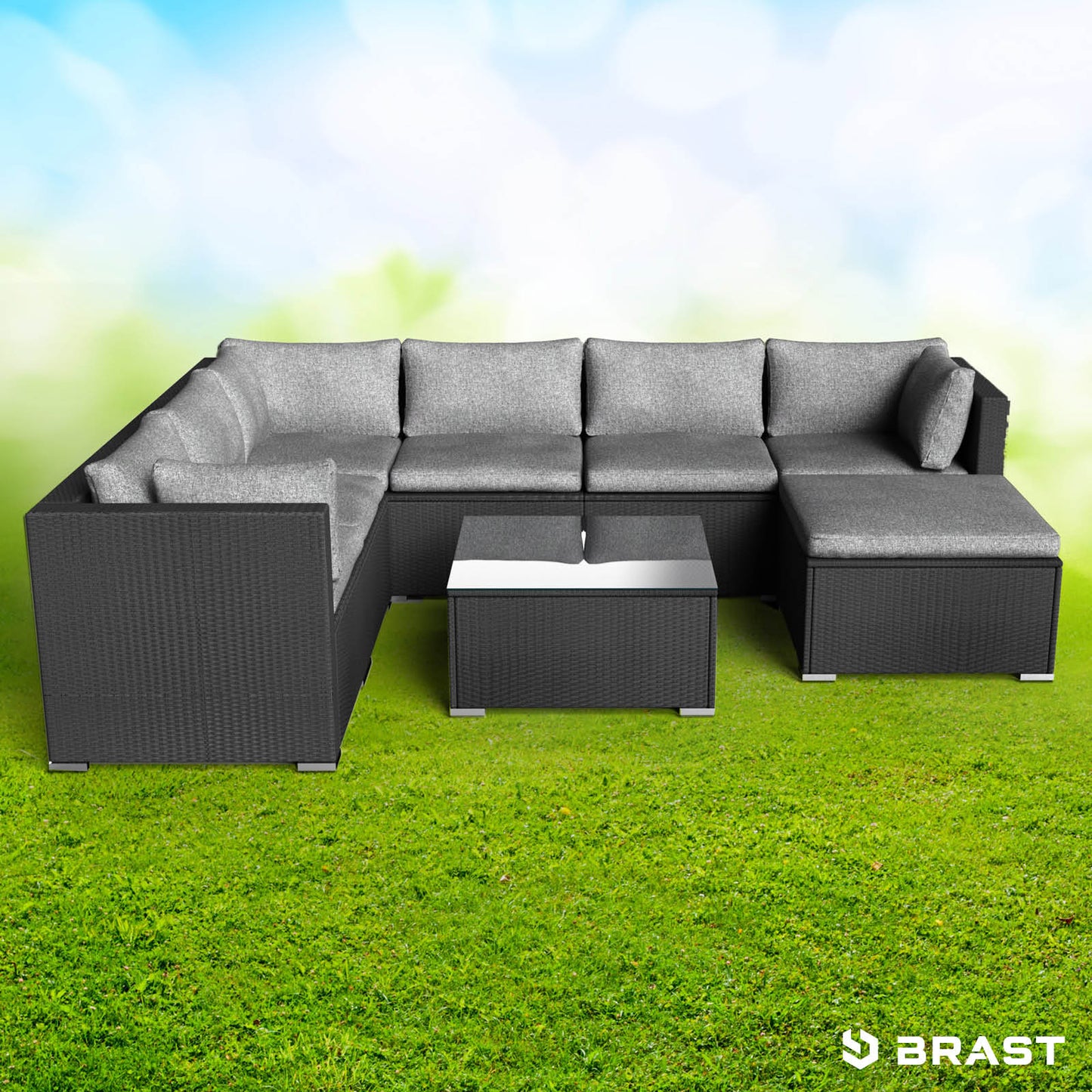 Schwarzes Rattan Lounge Gartenmöbel Set mit grauen Polstern und quadratischem Couchtisch.