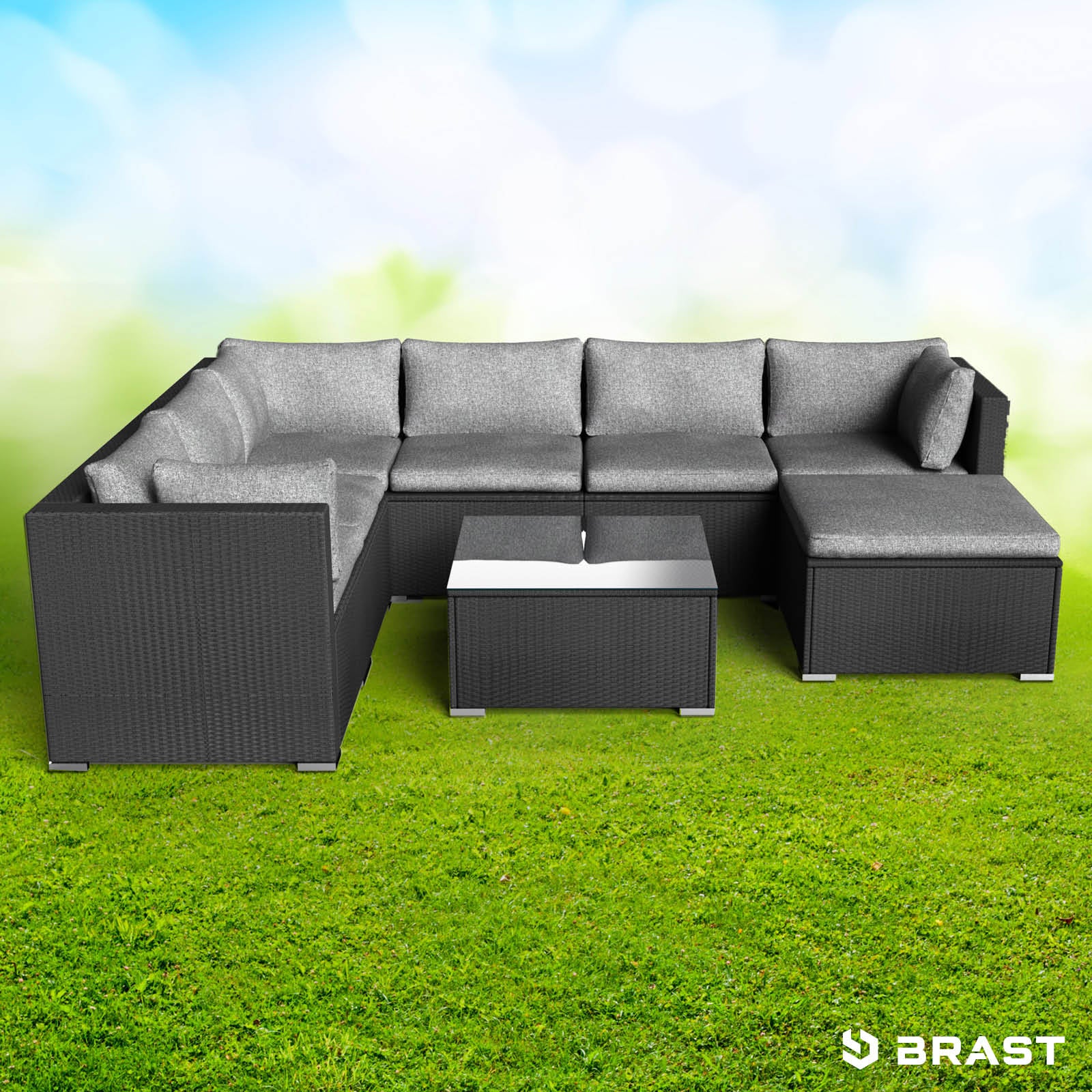 Schwarzes Rattan Lounge Gartenmöbel Set mit grauen Polstern und quadratischem Couchtisch.