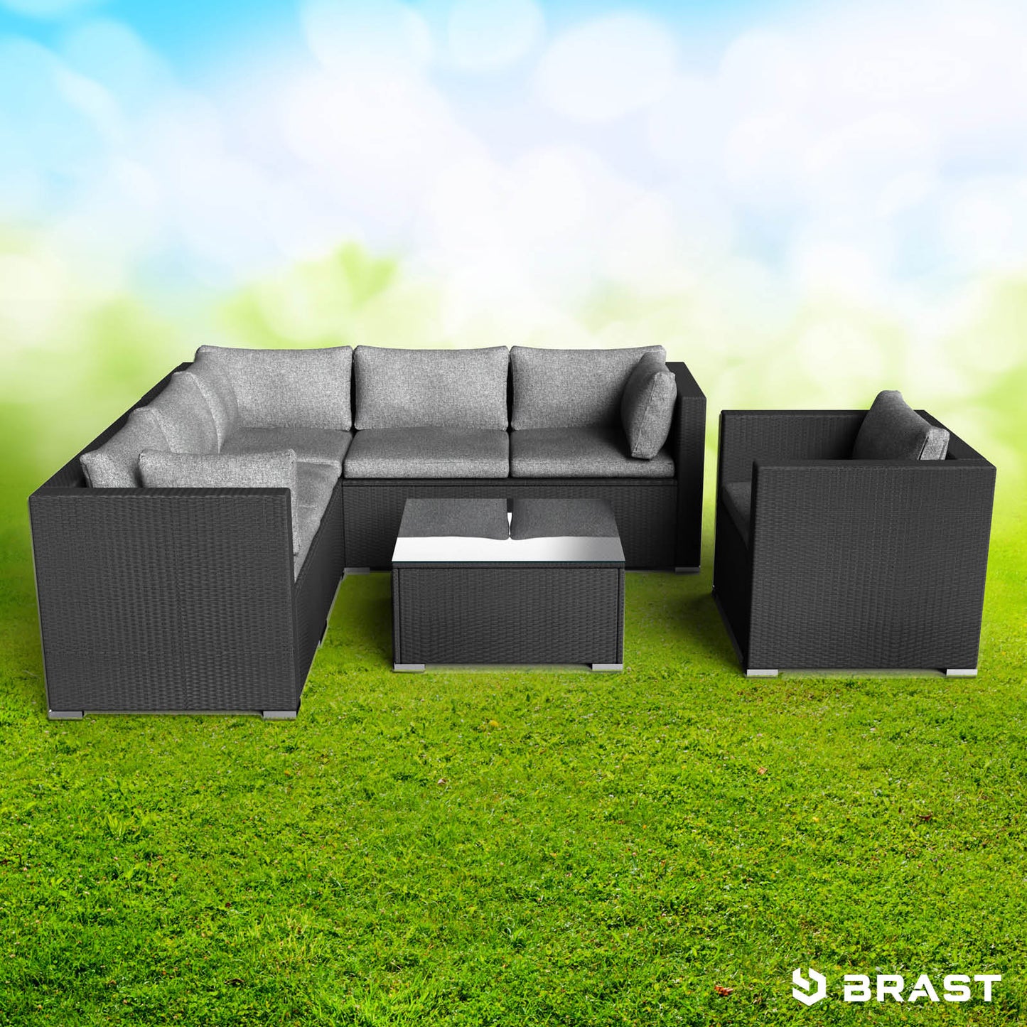 Schwarzes Polyrattan Loungemöbel Set mit grauen Kissen, inkl. Ecksofa und Sessel als Garten Lounge Möbel.
