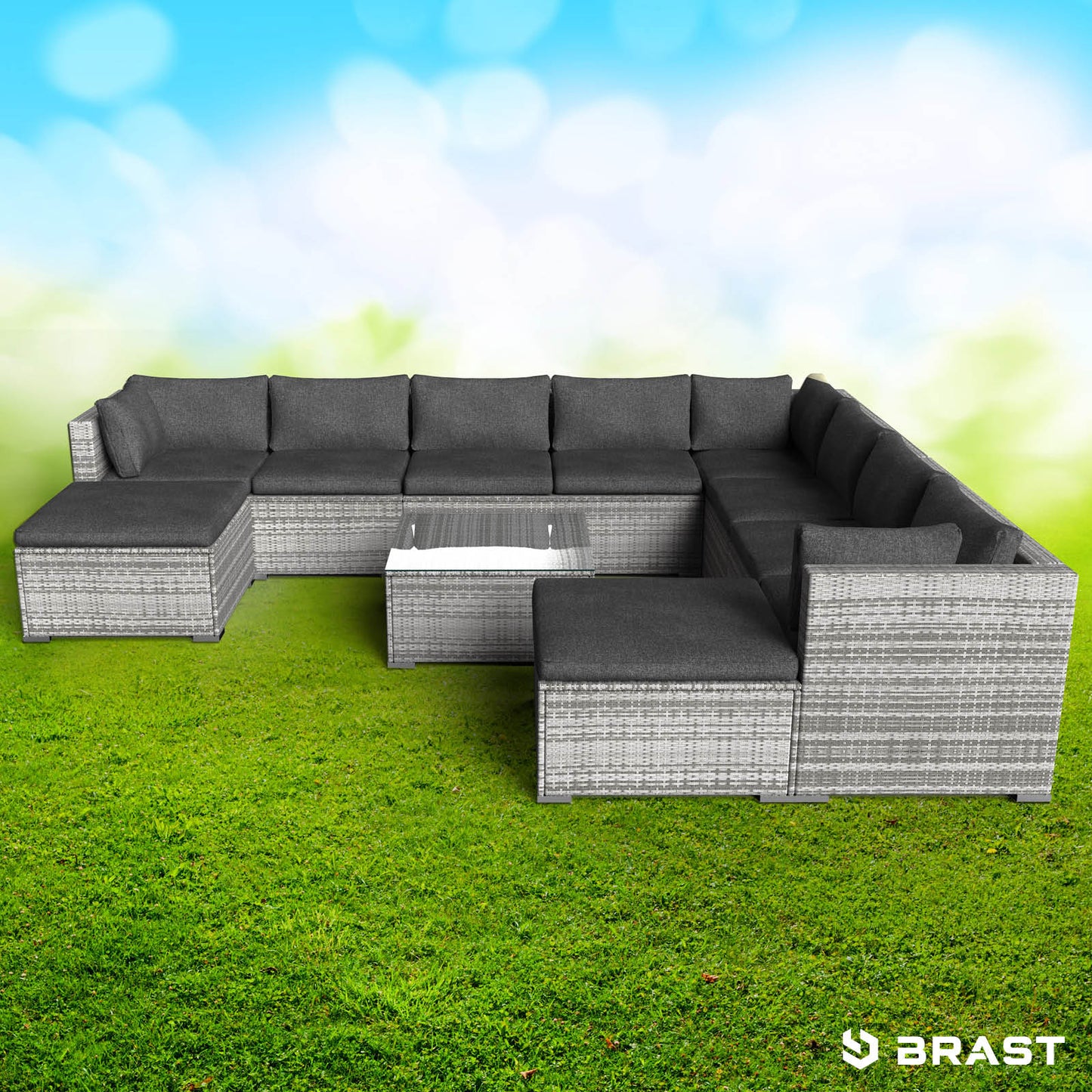 XXL Polyrattan lounge gartenmöbel set in Grau mit grauen Polstern auf grünem Rasen.