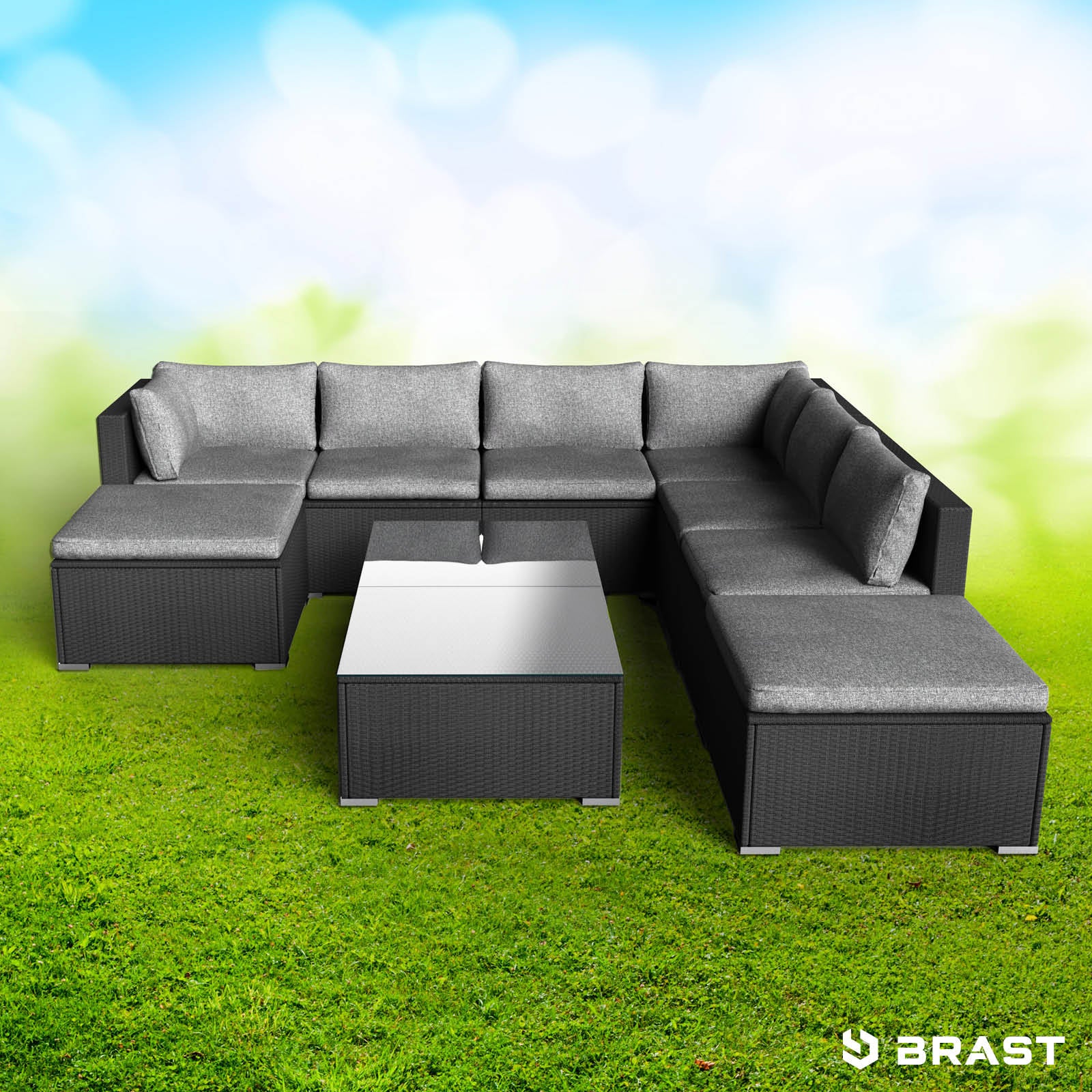 XL Poly Rattan Lounge Gartenmöbel Set in Schwarz mit grauen Polstern und weißem Tisch.