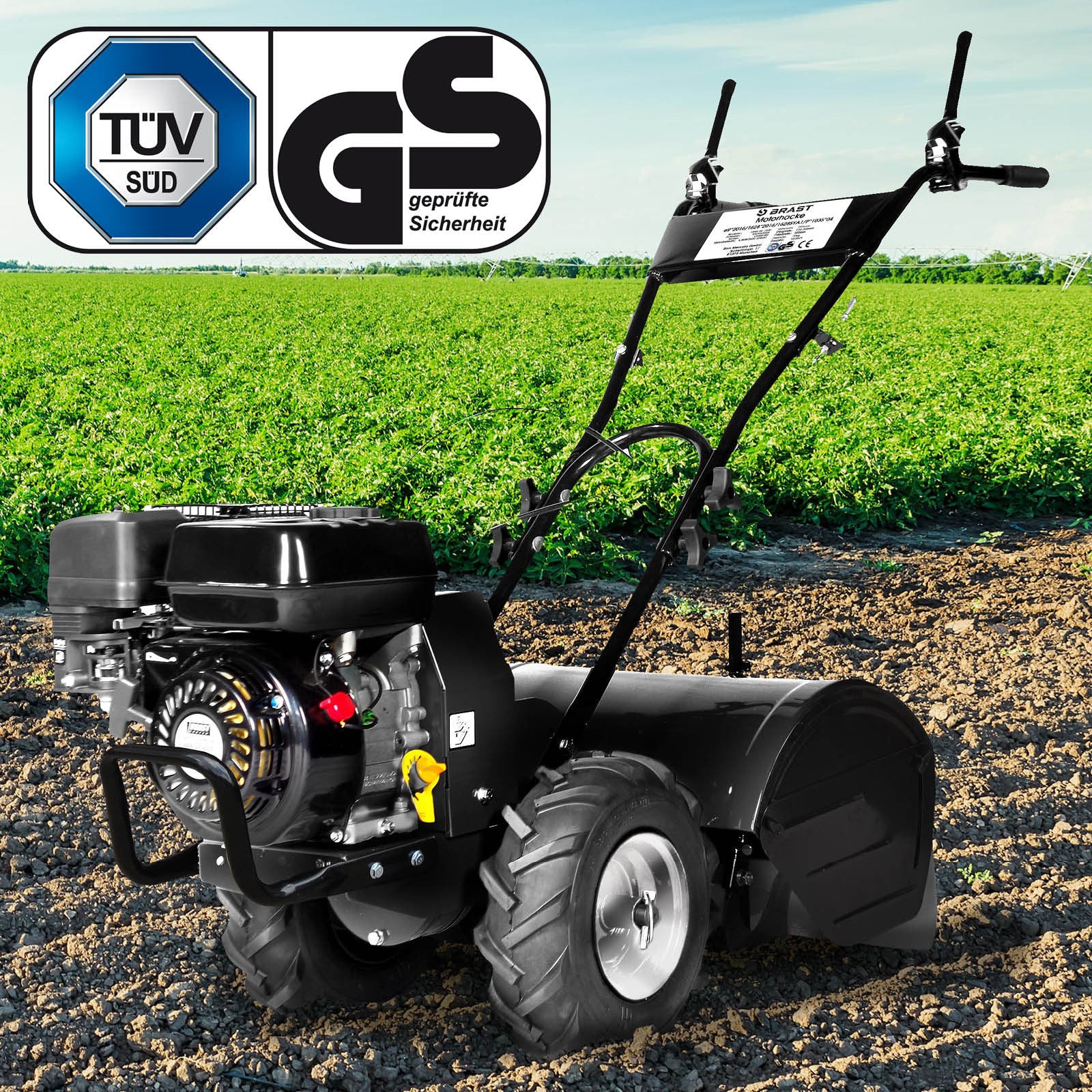 Schwarze Benzin Gartenfräse mit großem Motor, robusten Reifen und Motorhacke Pflug für Bodenlockerung.